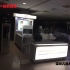 木质烤漆带玻璃化妆品柜台展示效果图