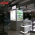 木质烤漆带玻璃化妆品柜台展示效果图